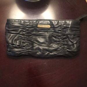 Black leather Micheal Kors clutch.